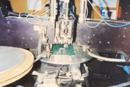 A close up of the inner-workers on one of the original pick and place machines at RiverSide in the 80s.